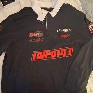 Air Jordan Rugby Black Long Sleeve Polo with White Collar and Red Logos